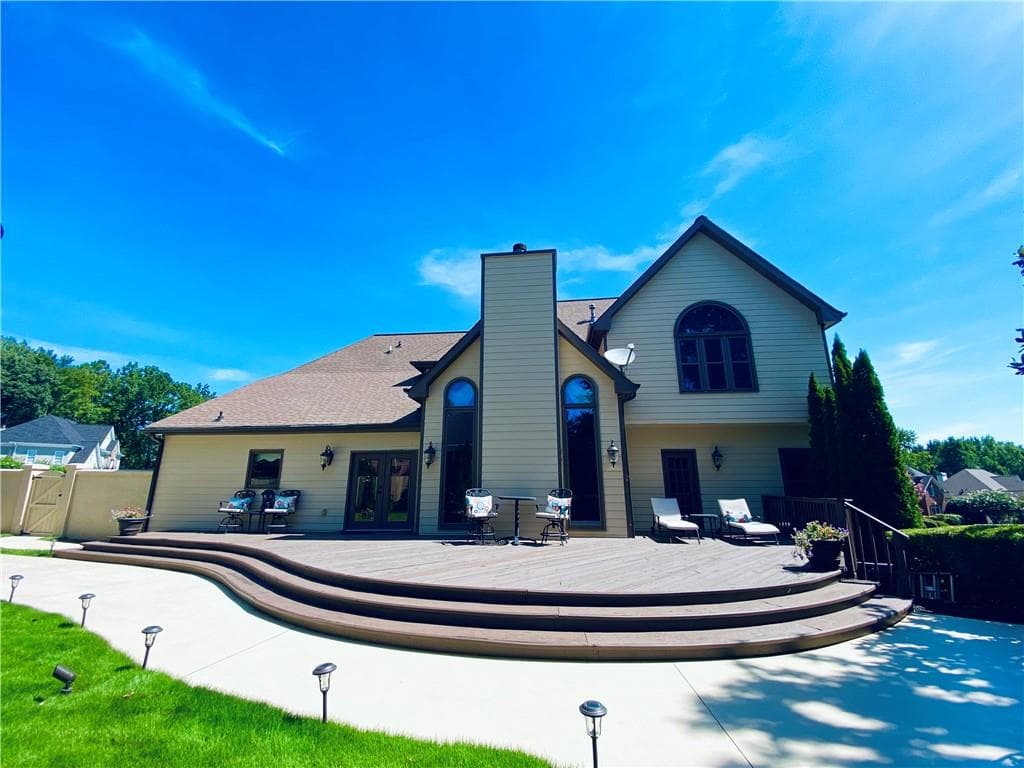 5 bedroom, 4 bathroom, 4,971 sq ft single family residence for sale at 10295 Groomsbridge Road, Johns Creek, GA 30022 — photo 7