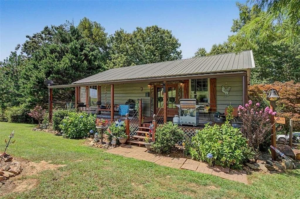 2 bedroom, 3 bathroom, 1,680 sq ft single family residence for sale at 5119 E Highway 166, Carrollton, GA 30116 — photo 3