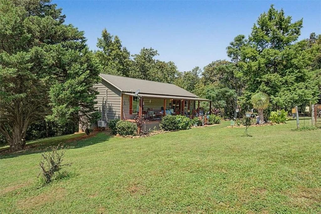 2 bedroom, 3 bathroom, 1,680 sq ft single family residence for sale at 5119 E Highway 166, Carrollton, GA 30116 — photo 4