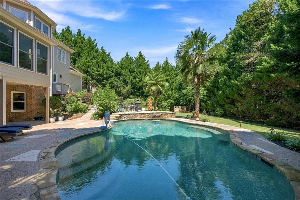 6 bedroom, 5 bathroom, 6,588 sq ft single family residence for sale at 1044 Meadow Club Court, Suwanee, GA 30024 — photo 4