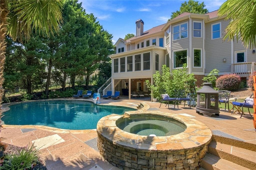 6 bedroom, 5 bathroom, 6,588 sq ft single family residence for sale at 1044 Meadow Club Court, Suwanee, GA 30024 — photo 5