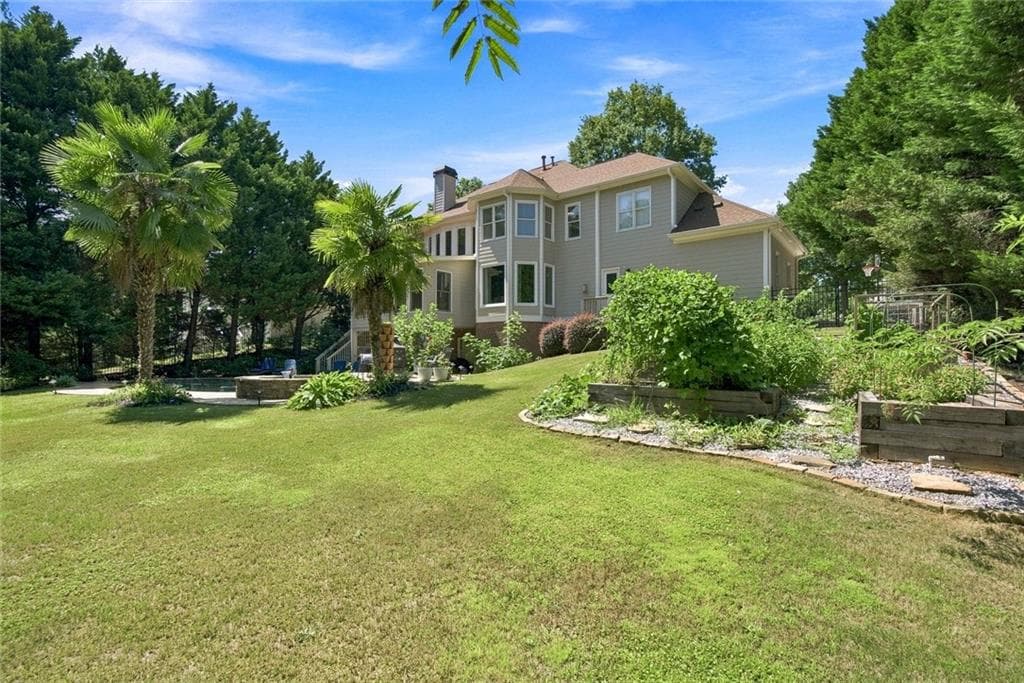 6 bedroom, 5 bathroom, 6,588 sq ft single family residence for sale at 1044 Meadow Club Court, Suwanee, GA 30024 — photo 6