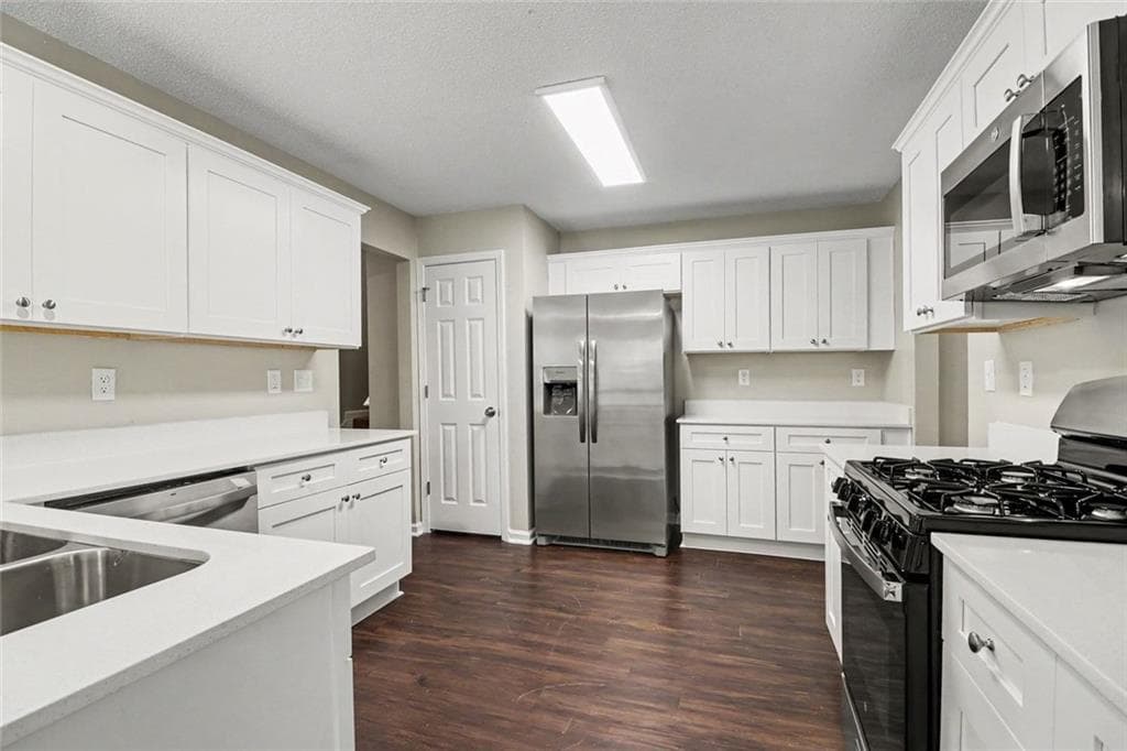 5 bedroom, 3 bathroom, 2,863 sq ft single family residence for sale at 2267 Rocksram Court, Buford, GA 30519 — photo 9