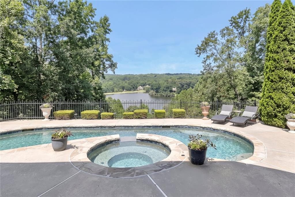 6 bedroom, 5 bathroom, 6,538 sq ft single family residence for sale at 701 Lake Overlook Drive, Canton, GA 30114 — photo 2
