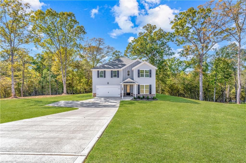 5 bedroom, 4 bathroom, 2,580 sq ft single family residence for sale at 497 Lawson Drive, Mansfield, GA 30055 — photo 2