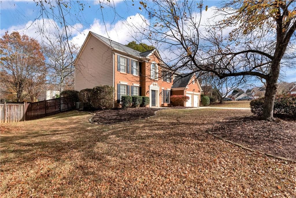4 bedroom, 3 bathroom, 2,730 sq ft single family residence for sale at 7530 Newstead Drive, Cumming, GA 30041 — photo 2