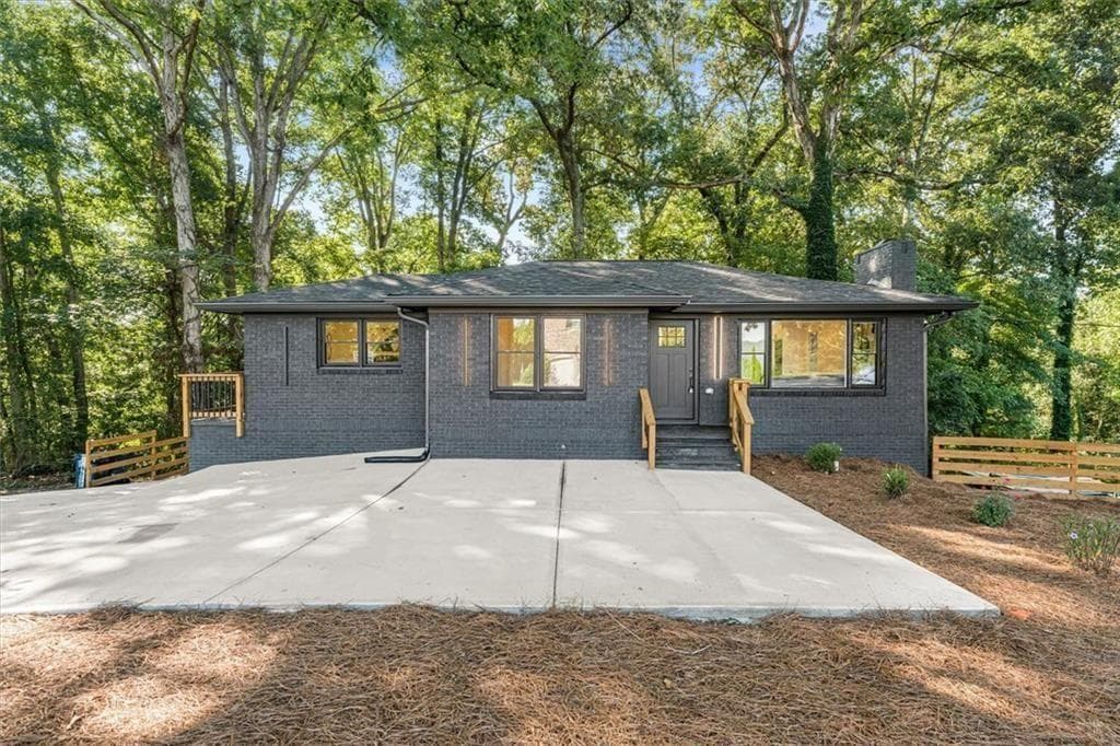 4 bedroom, 3 bathroom, 2,400 sq ft single family residence for sale at 6025 Oakdale Road, Mableton, GA 30126 — photo 1 of 44