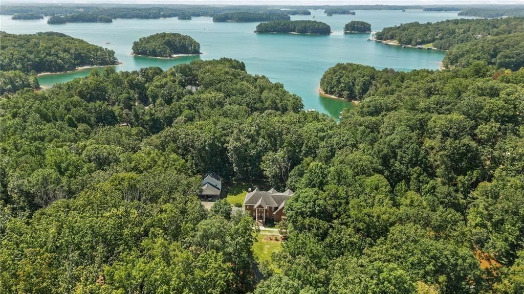 7 bedroom, 7 bathroom, 6,515 sq ft single family residence for sale at 7488 Shadburn Ferry Road, Cumming, GA 30041 — photo 6