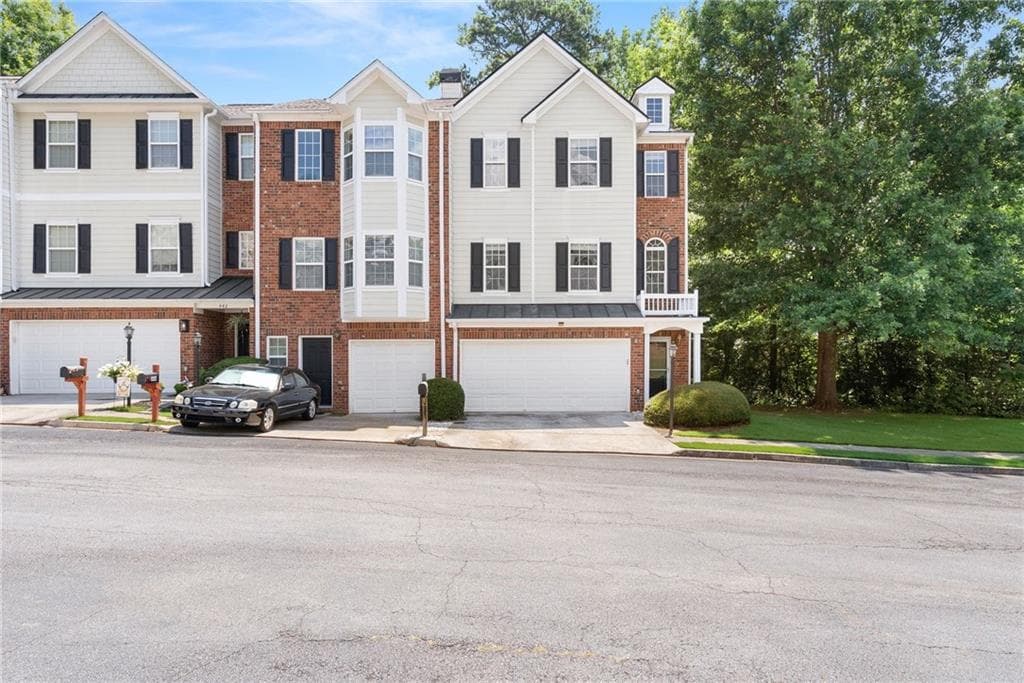 3 bedroom, 4 bathroom, 2,130 sq ft townhouse for sale at 446 Sandtrap Lane, Buford, GA 30518