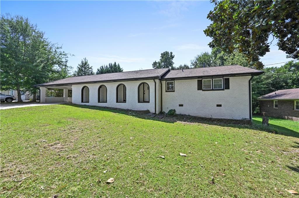 3 bedroom, 2 bathroom, 1,989 sq ft single family residence for sale at 5692 Rosser Court, Lilburn, GA 30047 — photo 2