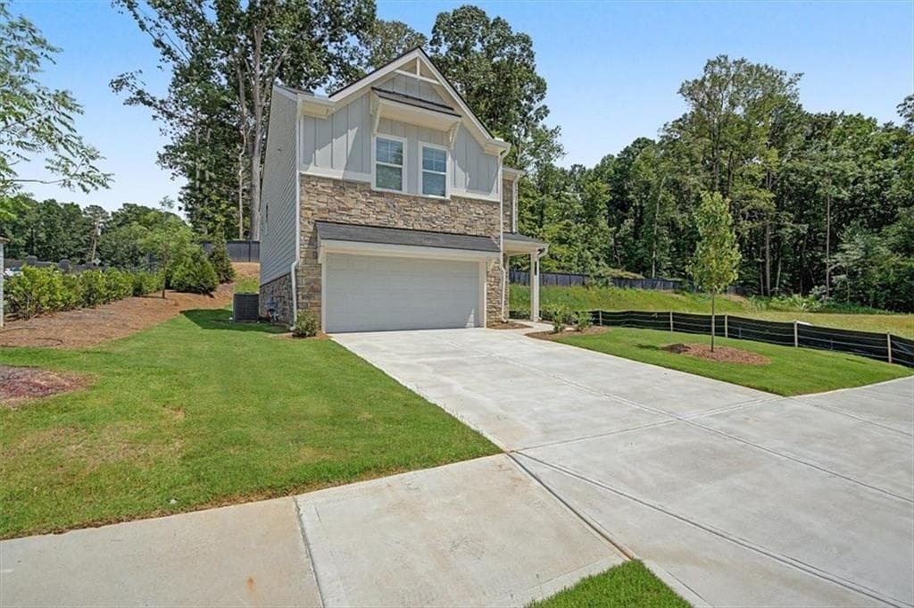 4 bedroom, 3 bathroom, 1,912 sq ft single family residence for sale at 5915 Titan Lane, Mableton, GA 30126 — photo 3