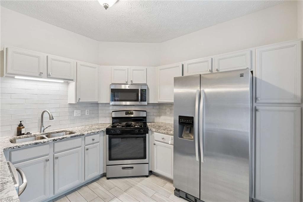 3 bedroom, 3 bathroom, 1,420 sq ft townhouse for sale at 2076 Pinnacle Pointe Drive, Norcross, GA 30071 — photo 4