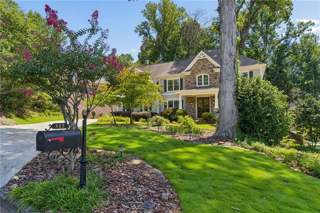 6 bedroom, 5 bathroom, 5,690 sq ft single family residence for sale at 385 Pandemar Trail, Lawrenceville, GA 30043 — photo 2