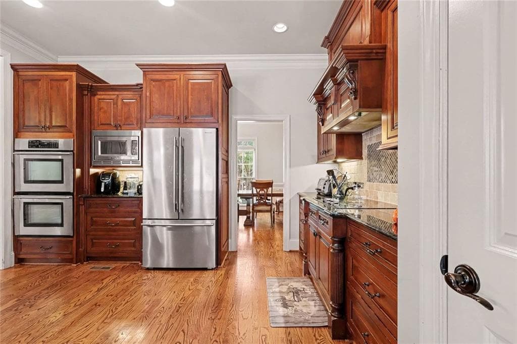 6 bedroom, 4 bathroom, 4,548 sq ft single family residence for sale at 2018 Newstead Court, Snellville, GA 30078 — photo 8