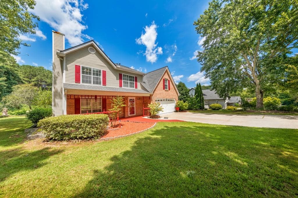 4 bedroom, 3 bathroom, 2,104 sq ft single family residence for sale at 1675 Round Road, Grayson, GA 30017 — photo 2