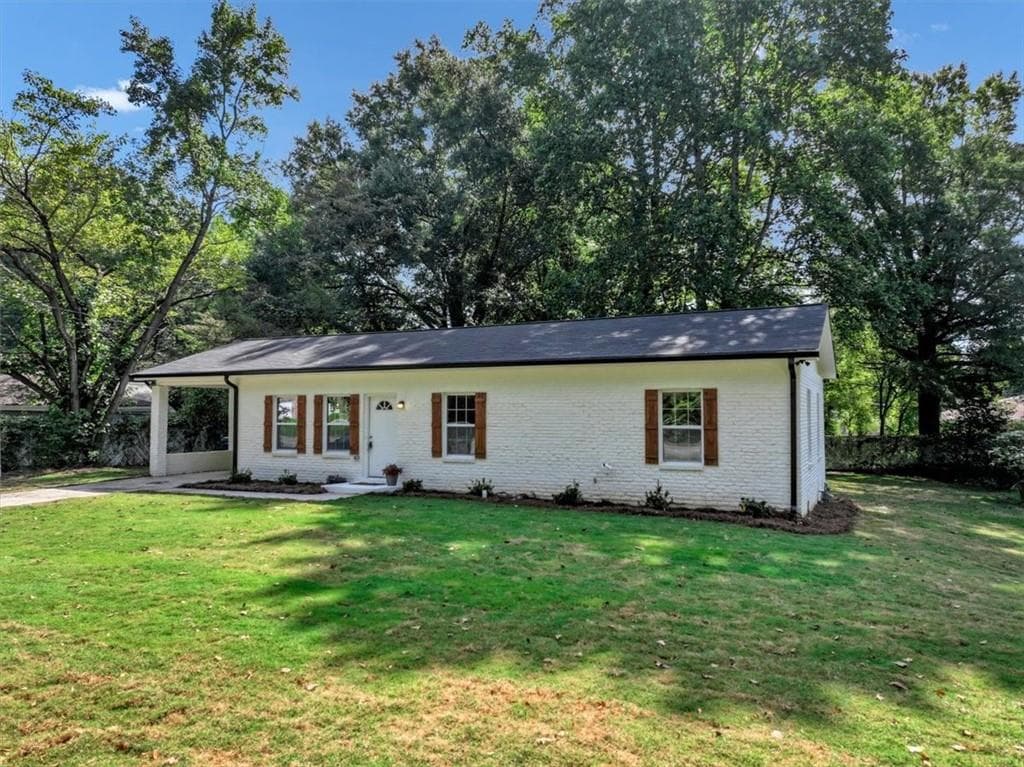 3 bedroom, 2 bathroom, 1,300 sq ft single family residence for sale at 5530 Old Bill Cook Road, Atlanta, GA 30349 — photo 2