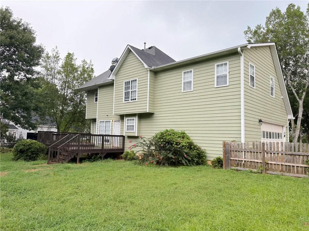 4 bedroom, 3 bathroom, 2,156 sq ft single family residence for sale at 464 Walnut Creek Drive, Stockbridge, GA 30281 — photo 2