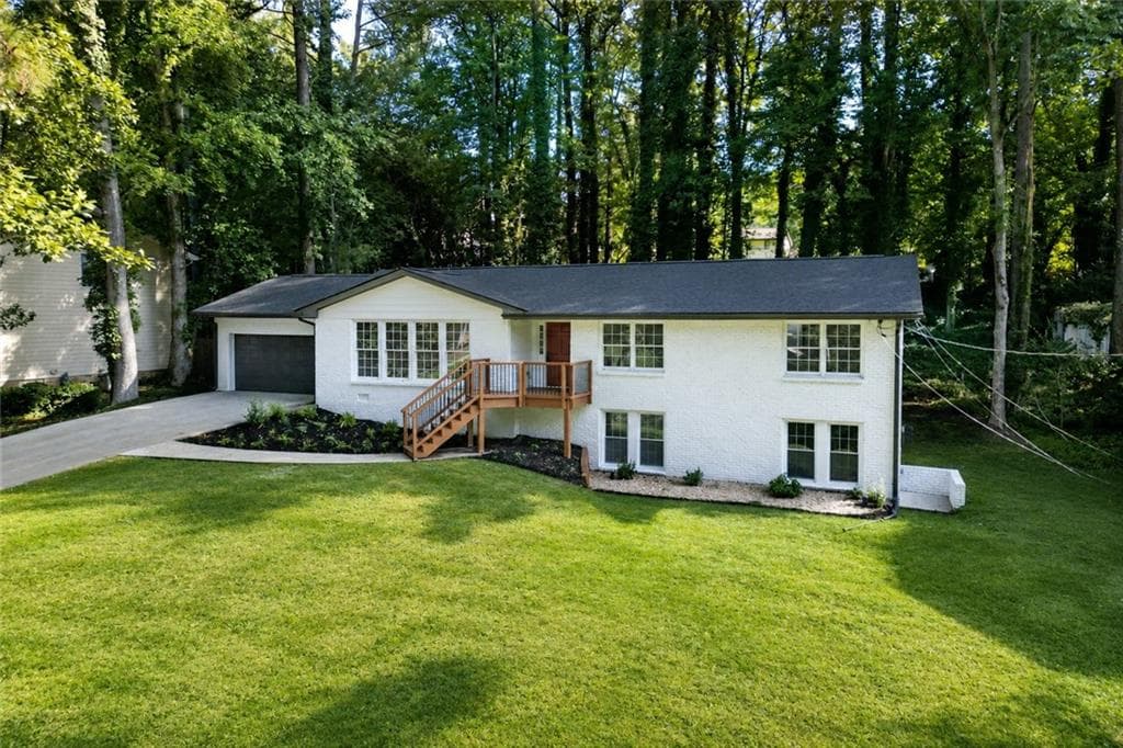 5 bedroom, 3 bathroom, 2,471 sq ft single family residence for sale at 664 Hickory Ridge Road, Lilburn, GA 30047