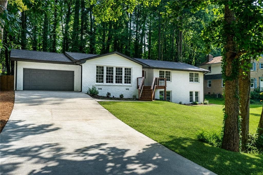 5 bedroom, 3 bathroom, 2,471 sq ft single family residence for sale at 664 Hickory Ridge Road, Lilburn, GA 30047 — photo 2