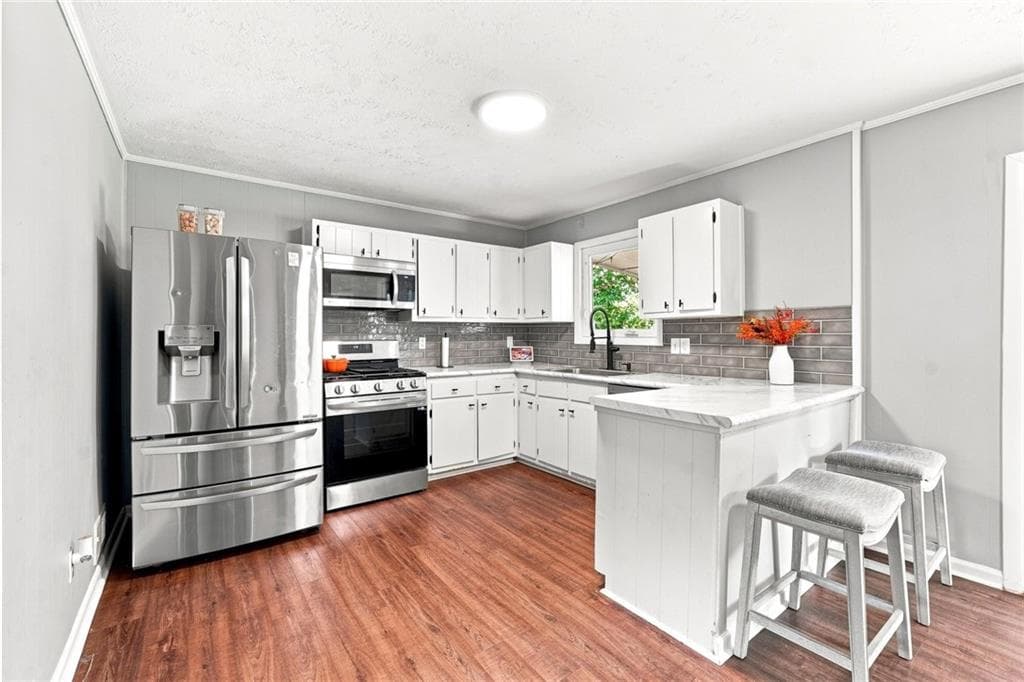 3 bedroom, 2 bathroom, 1,851 sq ft single family residence for sale at 624 Village Lane Drive, Marietta, GA 30060 — photo 3