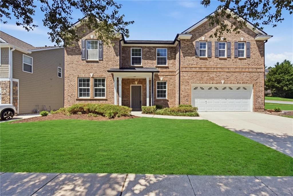 5 bedroom, 3 bathroom, 3,992 sq ft single family residence for sale at 1203 Lanier Springs Drive, Buford, GA 30518