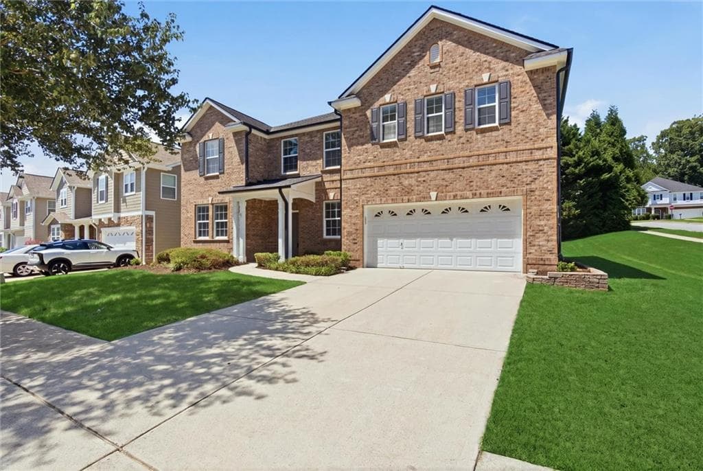 5 bedroom, 3 bathroom, 3,992 sq ft single family residence for sale at 1203 Lanier Springs Drive, Buford, GA 30518 — photo 2