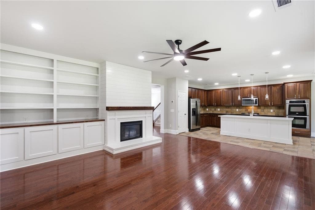 5 bedroom, 3 bathroom, 3,992 sq ft single family residence for sale at 1203 Lanier Springs Drive, Buford, GA 30518 — photo 6