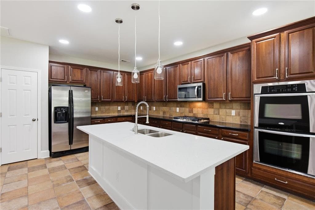 5 bedroom, 3 bathroom, 3,992 sq ft single family residence for sale at 1203 Lanier Springs Drive, Buford, GA 30518 — photo 7