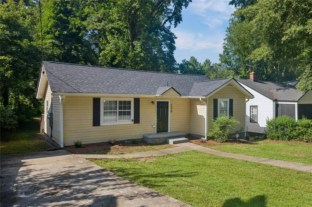 3 bedroom, 2 bathroom, 1,066 sq ft single family residence for sale at 1776 N Olympian Way, Atlanta, GA 30310 — photo 2
