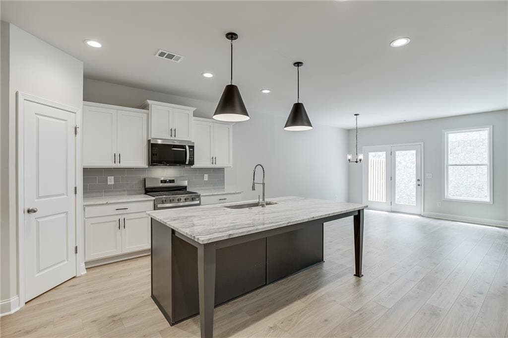3 bedroom, 3 bathroom, 1,834 sq ft townhouse for sale at 753 Woods Chapel Road Lot 100, Sugar Hill, GA 30518 — photo 5