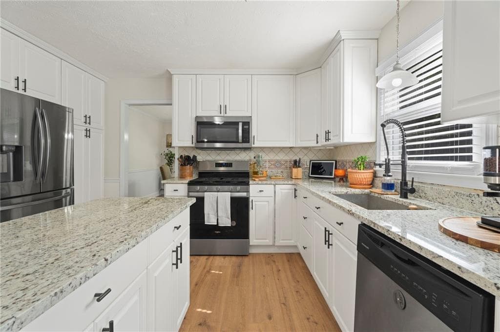 4 bedroom, 3 bathroom, 3,193 sq ft single family residence for sale at 3525 Rock Falls Drive, Snellville, GA 30039 — photo 8