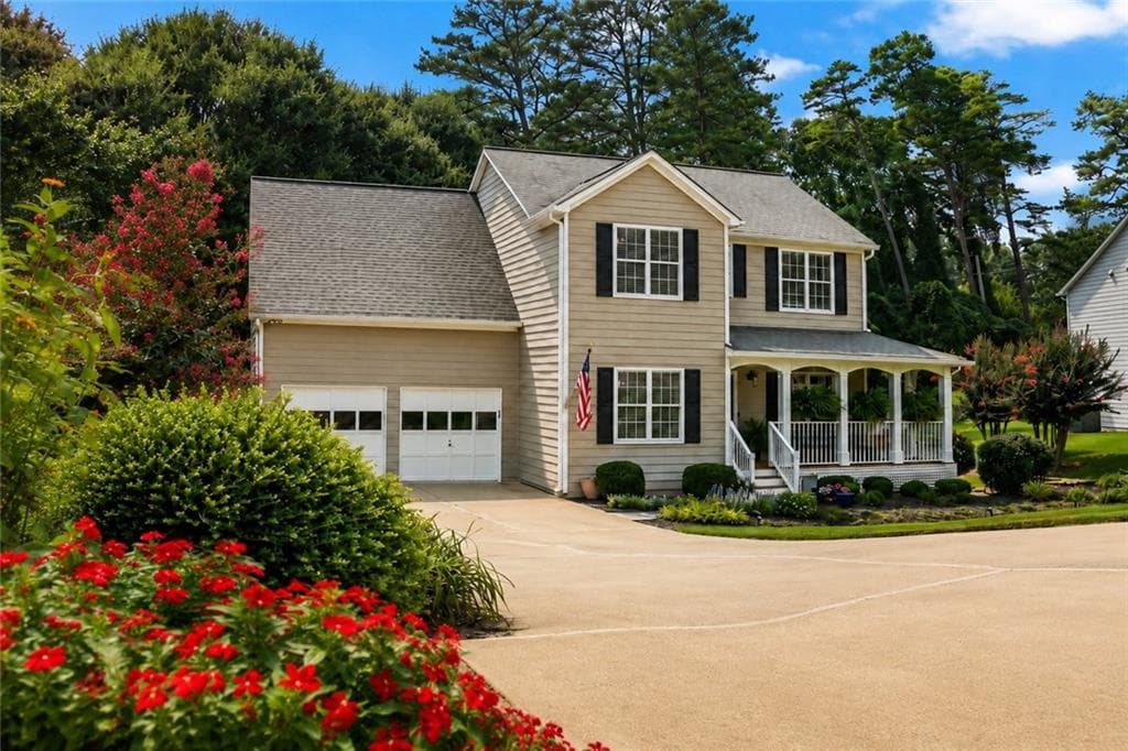 4 bedroom, 3 bathroom, 1,860 sq ft single family residence for sale at 7660 Streamside Lane, Cumming, GA 30028 — photo 1 of 13