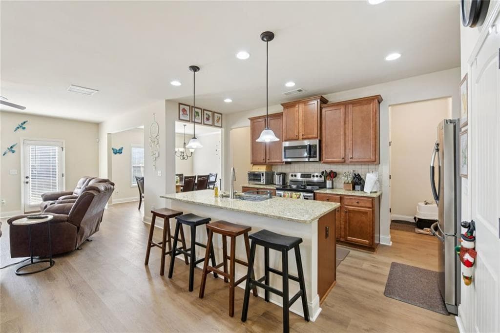 4 bedroom, 3 bathroom, 2,480 sq ft single family residence for sale at 2002 Bridgewater Pass, Hampton, GA 30228 — photo 7
