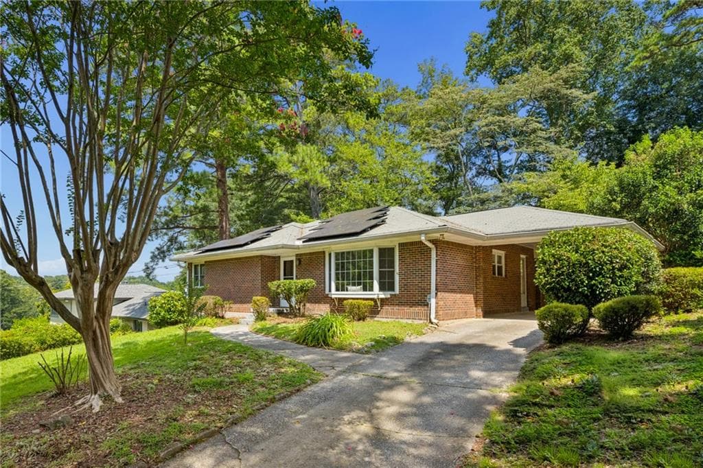 2 bedroom, 2 bathroom, 1,402 sq ft single family residence for sale at 1232 Carol Lane, Atlanta, GA 30306 — photo 1 of 36