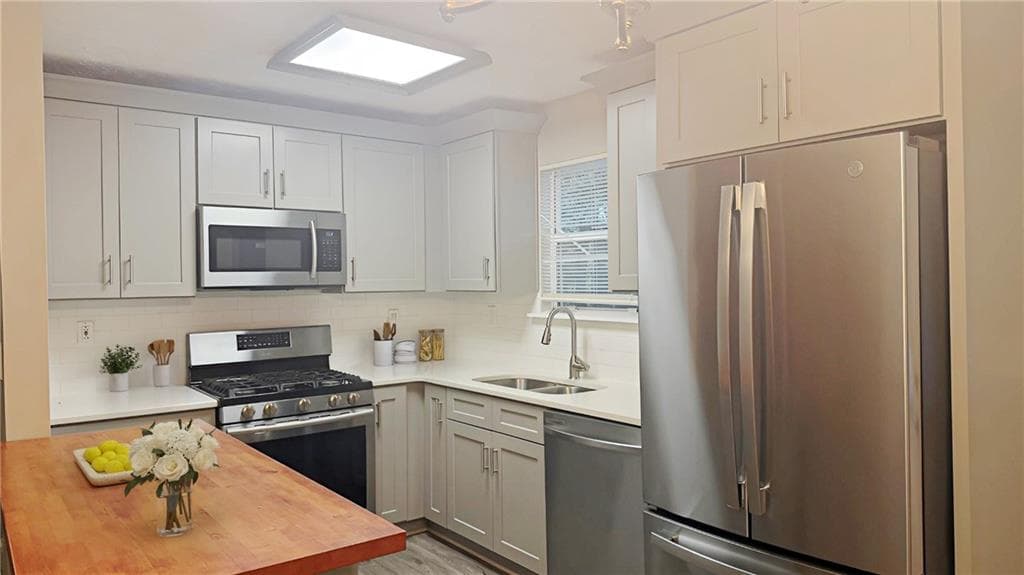 4 bedroom, 2 bathroom, 1,616 sq ft single family residence for sale at 141 Hemlock Circle, Lawrenceville, GA 30046 — photo 5