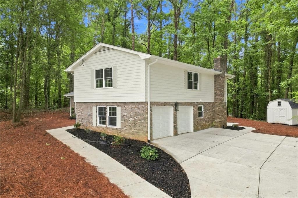 4 bedroom, 3 bathroom, 2,276 sq ft single family residence for sale at 4155 Burnt Hickory Road, Marietta, GA 30064 — photo 2