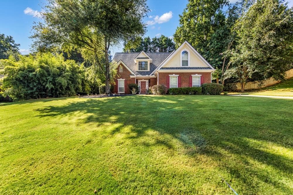 4 bedroom, 3 bathroom, 2,167 sq ft single family residence for sale at 165 Roberts Road, Suwanee, GA 30024