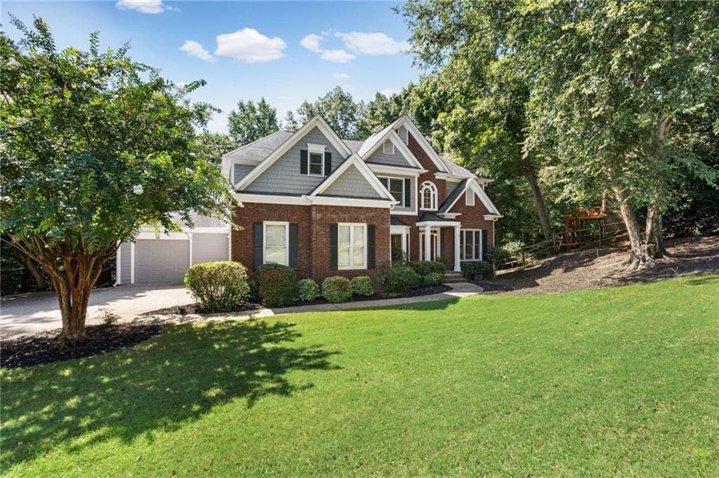 6 bedroom, 5 bathroom, 5,276 sq ft single family residence for sale at 4920 Pond Ridge Lane, Cumming, GA 30041 — photo 2