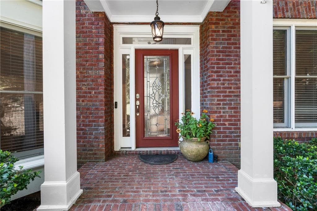 6 bedroom, 5 bathroom, 5,276 sq ft single family residence for sale at 4920 Pond Ridge Lane, Cumming, GA 30041 — photo 4
