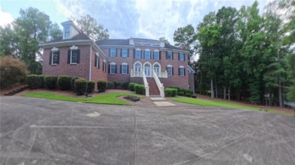 6 bedroom, 8 bathroom, 7,274 sq ft single family residence for sale at 2385 Hopewell Plantation Drive, Alpharetta, GA 30004 — photo 2