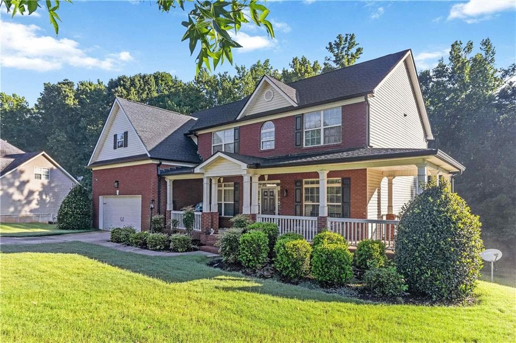 6 bedroom, 5 bathroom, 4,612 sq ft single family residence for sale at 168 Melrose Creek Drive, Stockbridge, GA 30281 — photo 2