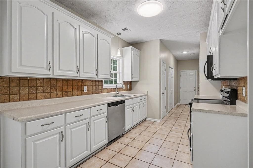 4 bedroom, 2 bathroom, 2,164 sq ft single family residence for sale at 1279 Coan Drive, Locust Grove, GA 30248 — photo 6