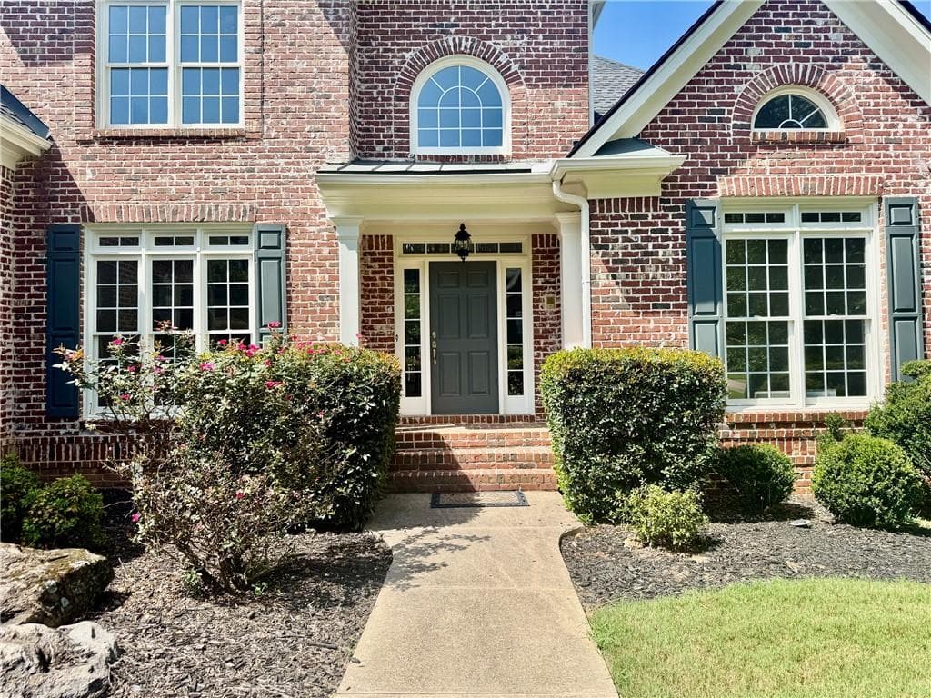 7 bedroom, 6 bathroom, 6,719 sq ft single family residence for sale at 7945 Saint Marlo Fairway Drive, Duluth, GA 30097 — photo 4