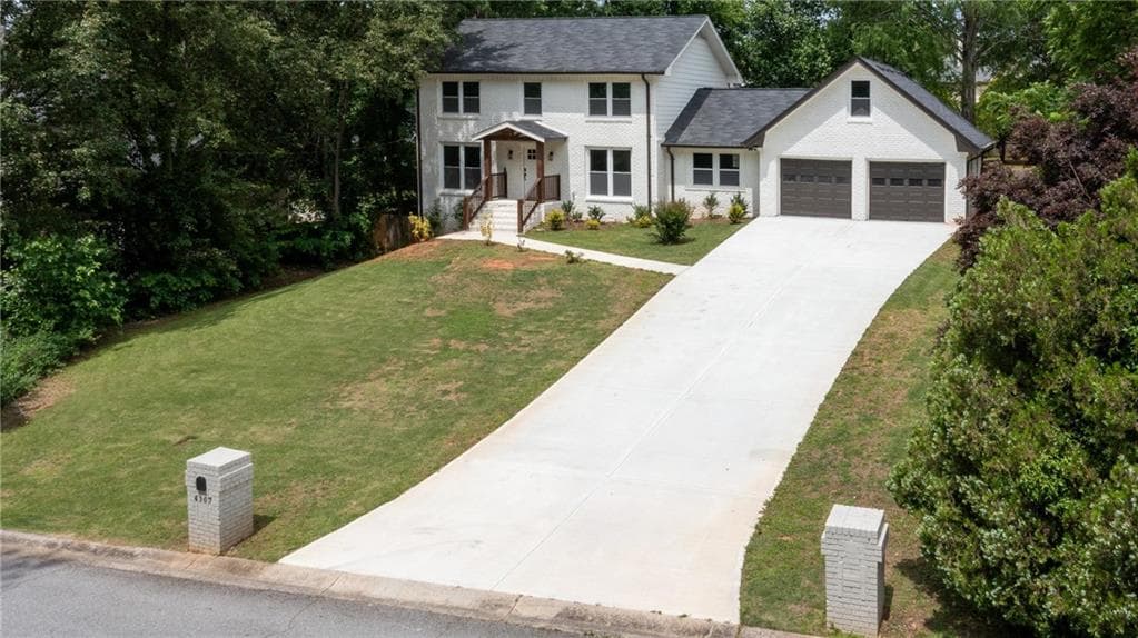 4 bedroom, 4 bathroom, 2,596 sq ft single family residence for sale at 4307 Cedar Wood Drive, Lilburn, GA 30047 — photo 2