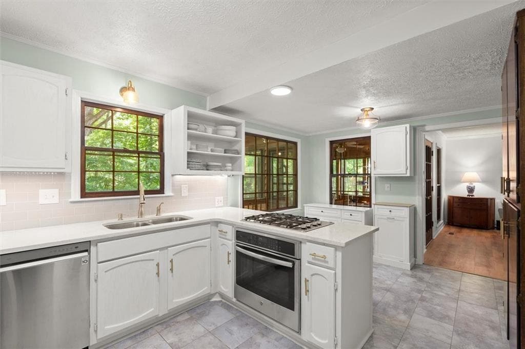 4 bedroom, 3 bathroom, 2,576 sq ft single family residence for sale at 3973 Guilford Court, Lilburn, GA 30047 — photo 5