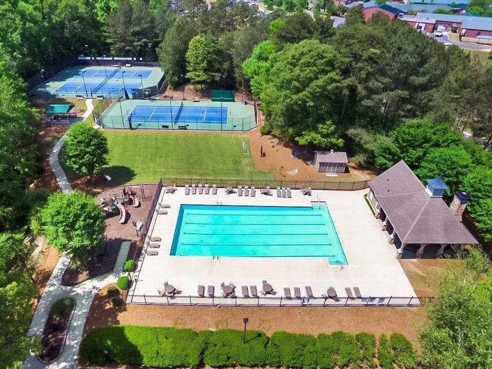4 bedroom, 3 bathroom, 3,418 sq ft single family residence for sale at 780 River Cliff Court, Suwanee, GA 30024 — photo 2