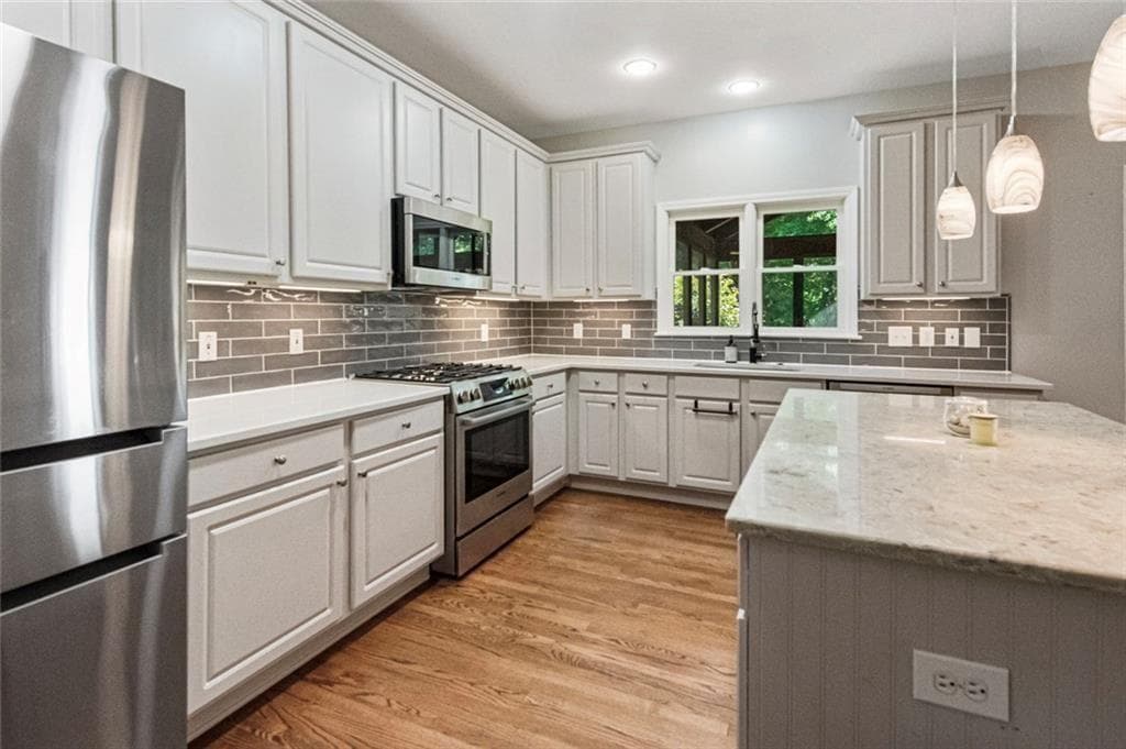 4 bedroom, 3 bathroom, 3,418 sq ft single family residence for sale at 780 River Cliff Court, Suwanee, GA 30024 — photo 4
