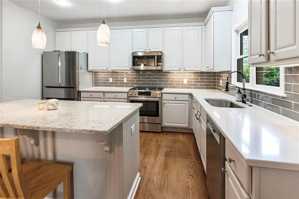 4 bedroom, 3 bathroom, 3,418 sq ft single family residence for sale at 780 River Cliff Court, Suwanee, GA 30024 — photo 7