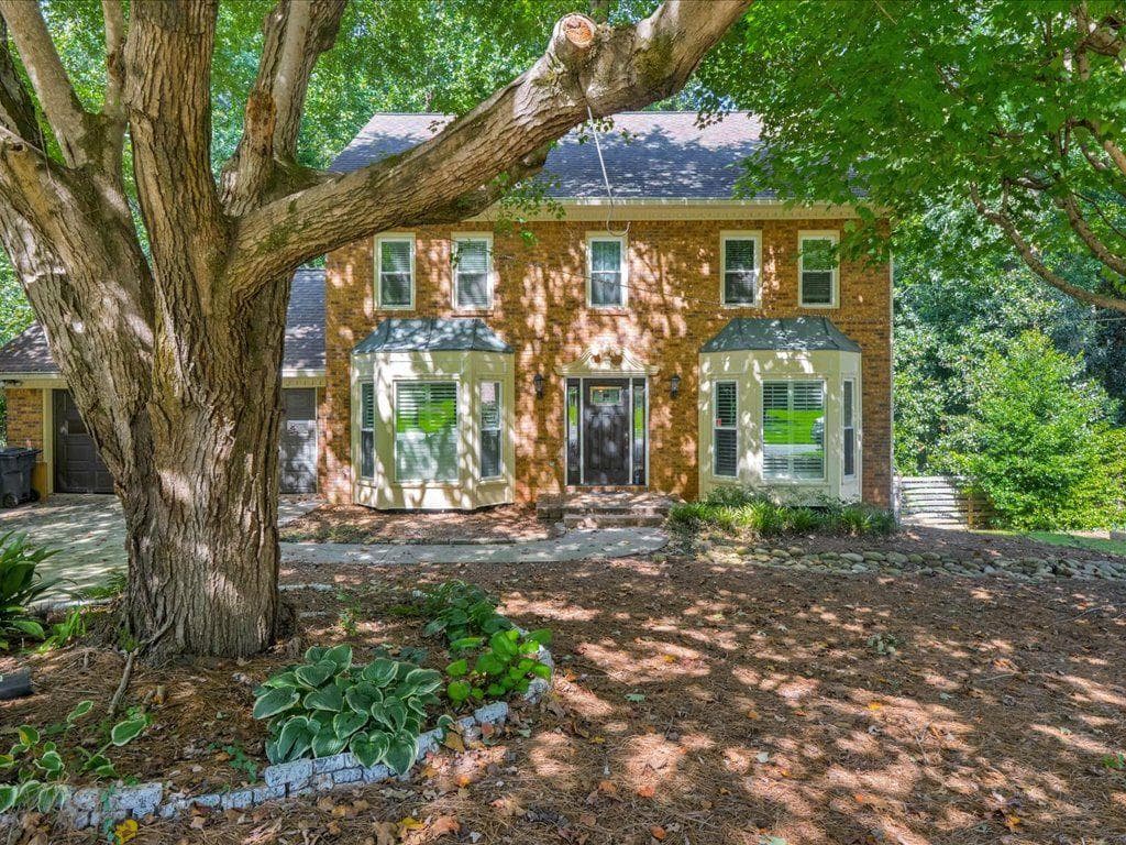 4 bedroom, 3 bathroom, 3,939 sq ft single family residence for sale at 27 Planters Drive, Lilburn, GA 30047 — photo 3
