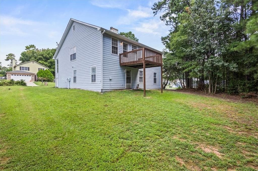 4 bedroom, 3 bathroom, 1,673 sq ft single family residence under contract at 5604 Rockingwood Lane, Atlanta, GA 30349 — photo 6